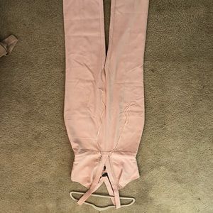 Light pink jumpsuit from bebe size 10